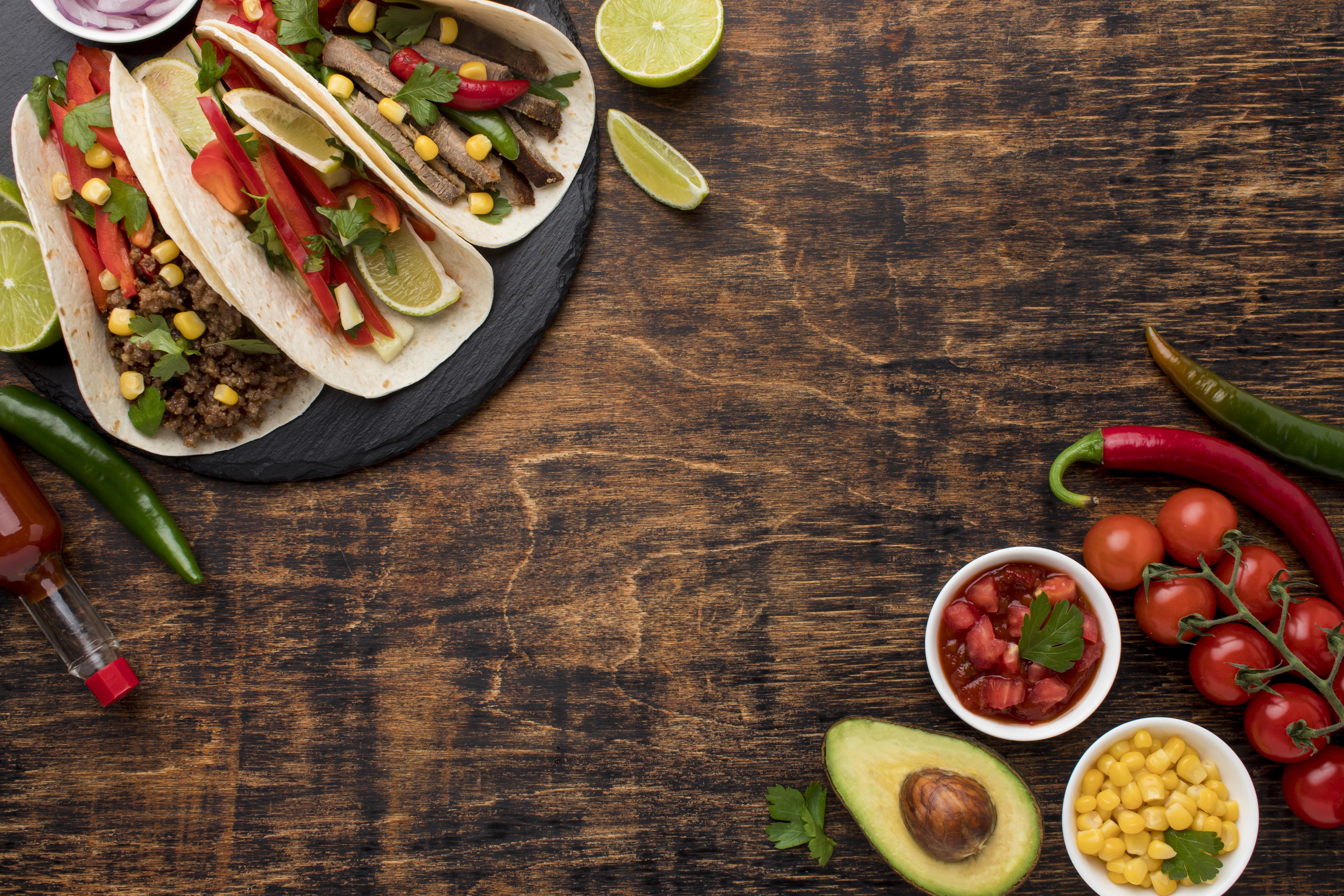 top-view-delicious-mexican-food-with-copy-space